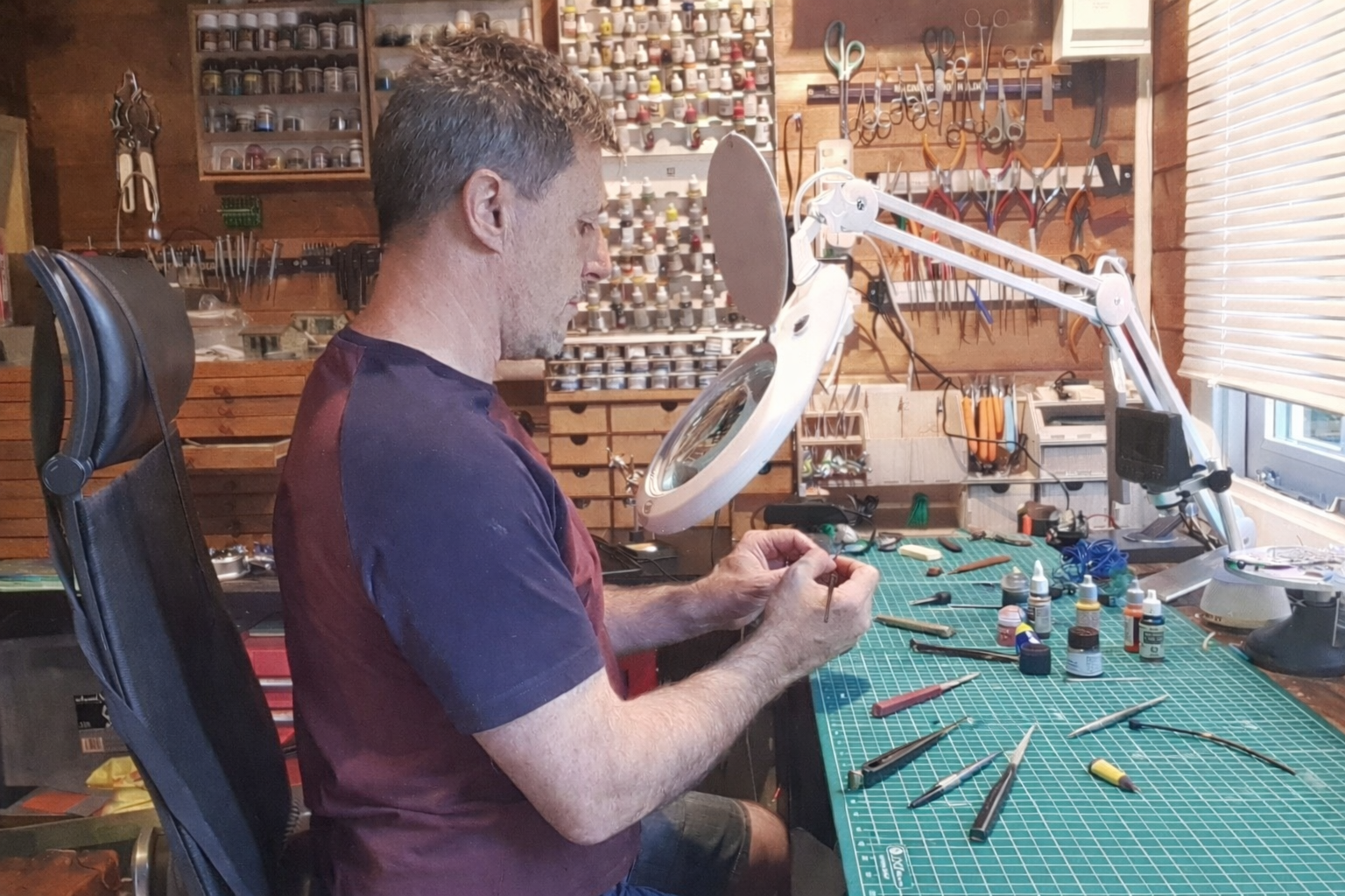 Andy Leaning at work in the Little World Workshop, Surrey