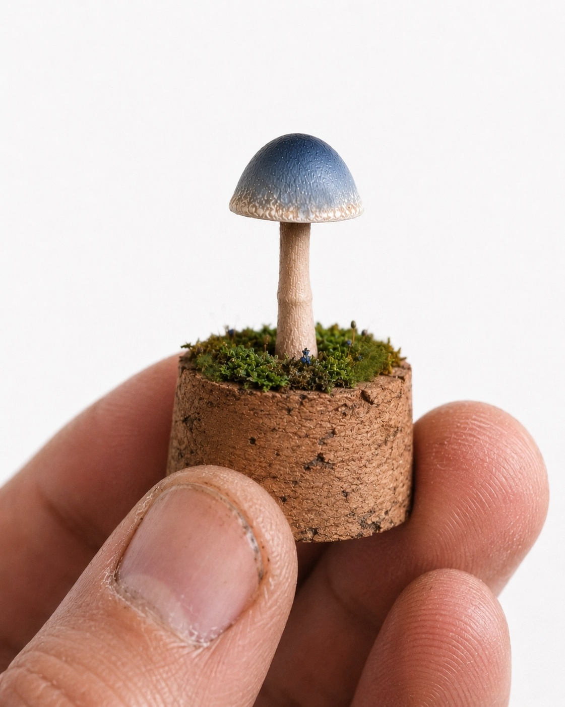 Miniature blue mushroom ornament under a glass cloche — handcrafted woodland display piece